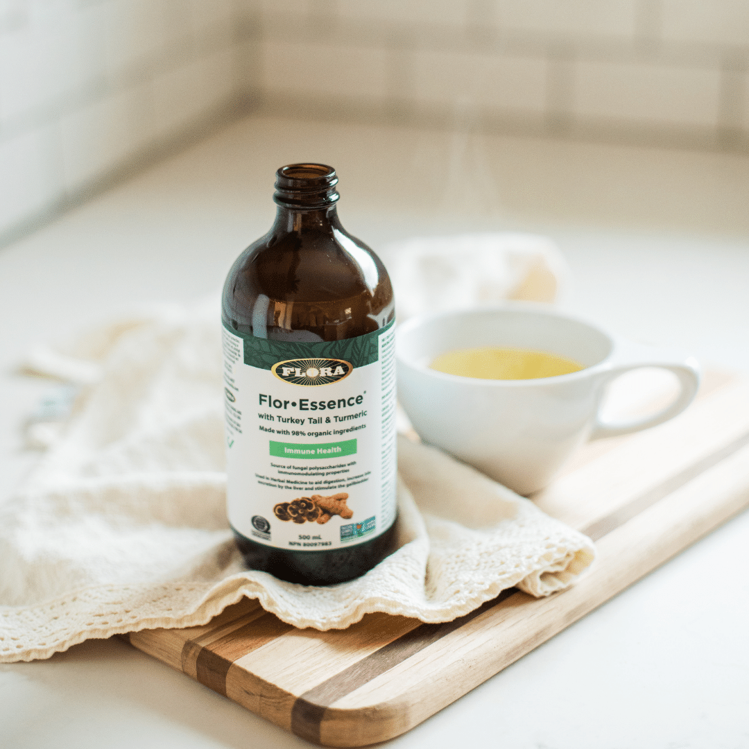 liquid immune system supplement poured into teacup to help support immune health