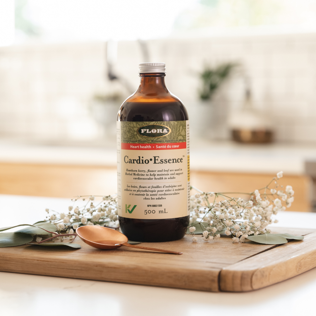 liquid supplement for heart with hawthorn, pictured with hawthorn flowers and leaves